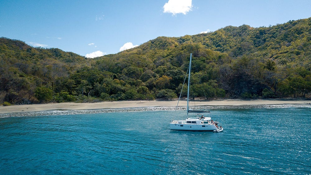 Secluded beach and catamaran